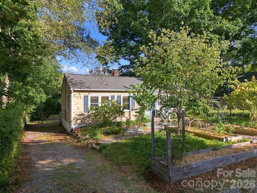 21 Balsam Avenue, Asheville, NC 28806.  MLS# CAR4423009, YatesRealty ID 52913. Private driveway with backyard access for campers or vehicles
