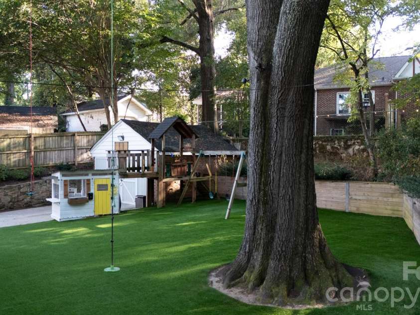 411 Dale Avenue, Gastonia, NC 28052.  MLS# CAR4427569, YatesRealty ID 52936. Backyard turf and shade