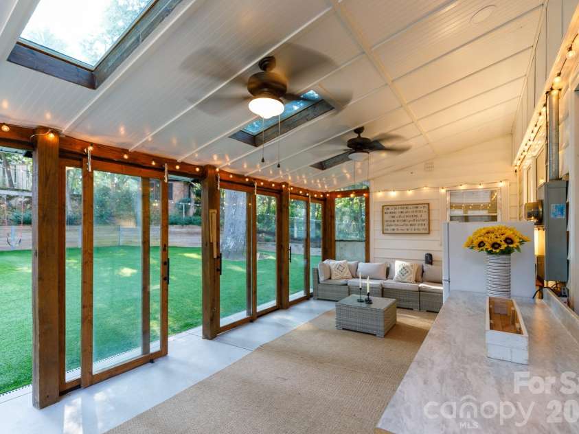 411 Dale Avenue, Gastonia, NC 28052.  MLS# CAR4427569, YatesRealty ID 52936. Sunroom w/ sky lights