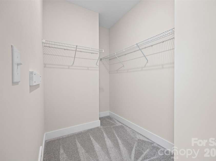 1229 Lomax Avenue, Charlotte, NC 28211.  MLS# CAR4427247, YatesRealty ID 52943. 3rd FL: Primary suite walk in closet