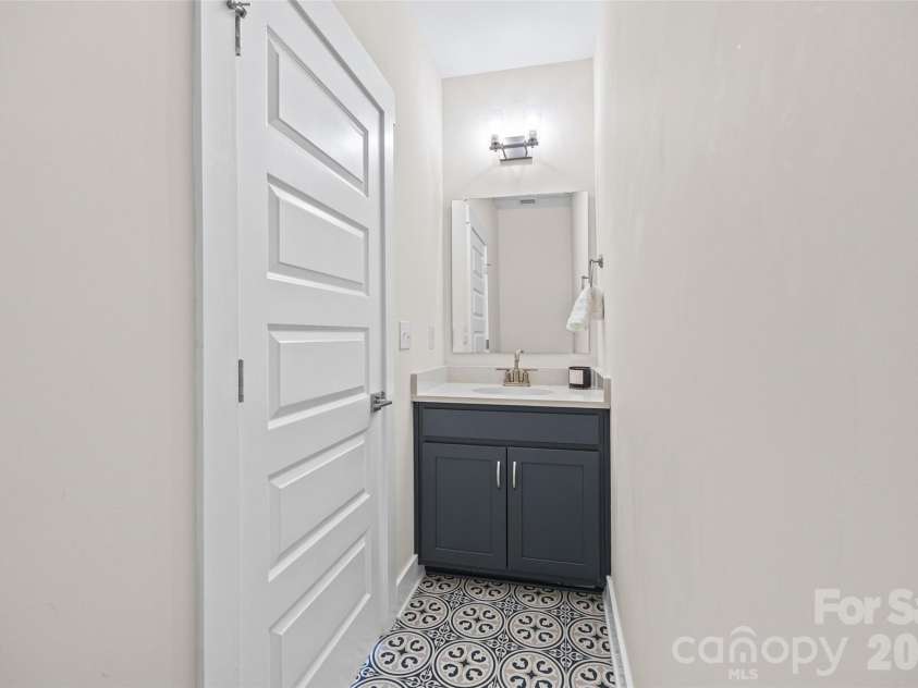 1229 Lomax Avenue, Charlotte, NC 28211.  MLS# CAR4427247, YatesRealty ID 52943. Flex-room 4th floor powder room with patterned tile