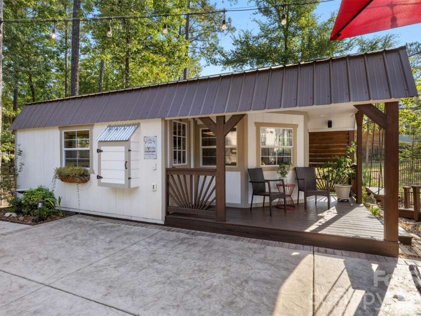 1604 Aragon Beach Road, Rock Hill, SC 29732.  MLS# CAR4427159, YatesRealty ID 52944. Detached pub shed adds a fun and unexpected entertaining space