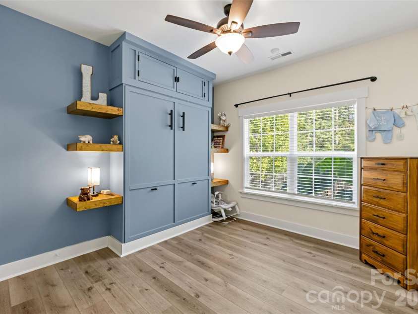 1604 Aragon Beach Road, Rock Hill, SC 29732.  MLS# CAR4427159, YatesRealty ID 52944. Flexible bedroom featuring a clever built-in Murphy bed
