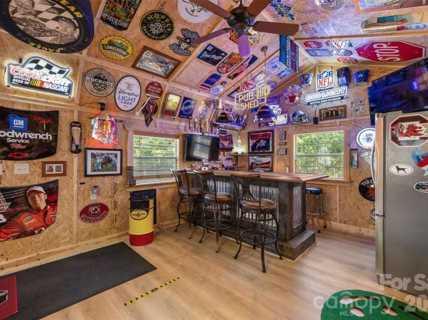 1604 Aragon Beach Road, Rock Hill, SC 29732.  MLS# CAR4427159, YatesRealty ID 52944. Packed with personality, this private pub is ready for game day