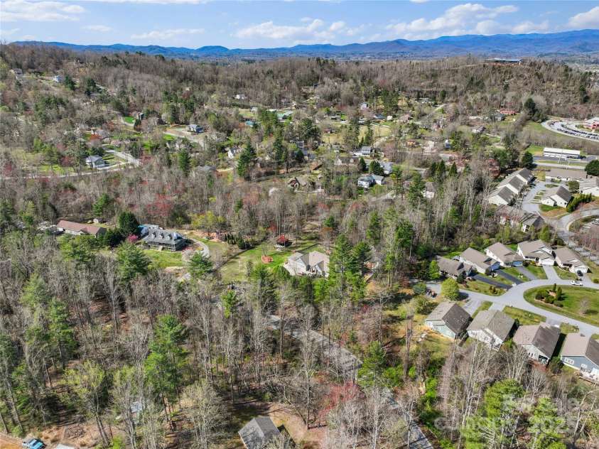 79 Pattys Chapel Road, Fletcher, NC 28732.  MLS# CAR4239671, YatesRealty ID 5295. Aerial view from the east