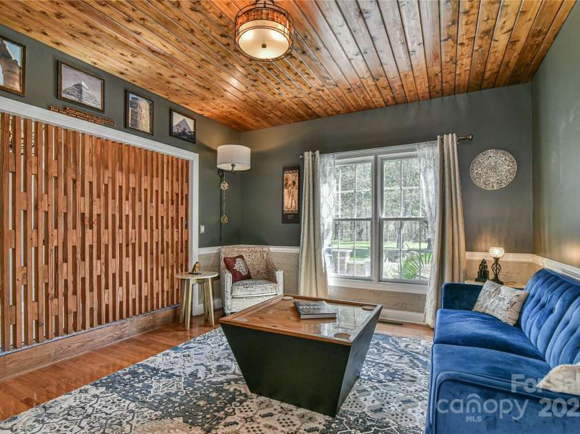 79 Pattys Chapel Road, Fletcher, NC 28732.  MLS# CAR4239671, YatesRealty ID 5295. Formal dining room has been used as an alternate living area for music and cocktails.