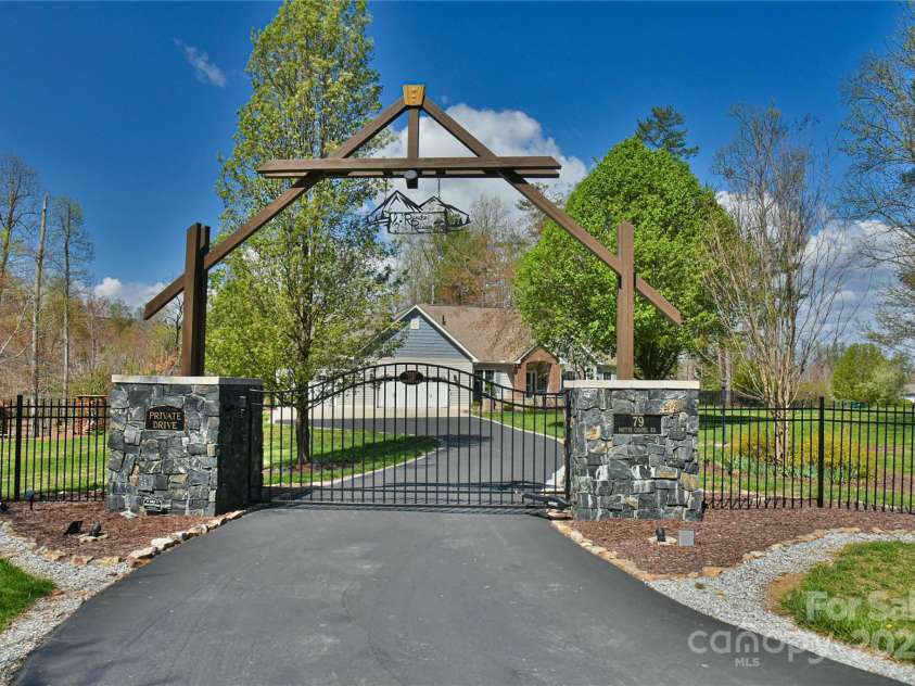 79 Pattys Chapel Road, Fletcher, NC 28732.  MLS# CAR4239671, YatesRealty ID 5295. Gated entry