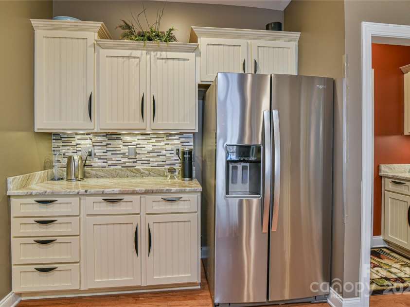 79 Pattys Chapel Road, Fletcher, NC 28732.  MLS# CAR4239671, YatesRealty ID 5295. Side-by-side fridge, granite counters