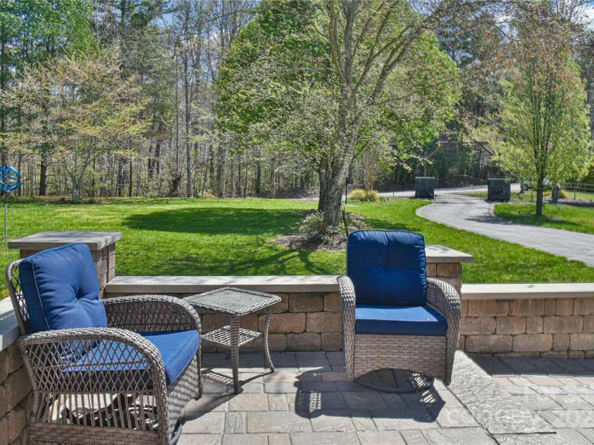 79 Pattys Chapel Road, Fletcher, NC 28732.  MLS# CAR4239671, YatesRealty ID 5295. Spacious front porch with room for lingering.