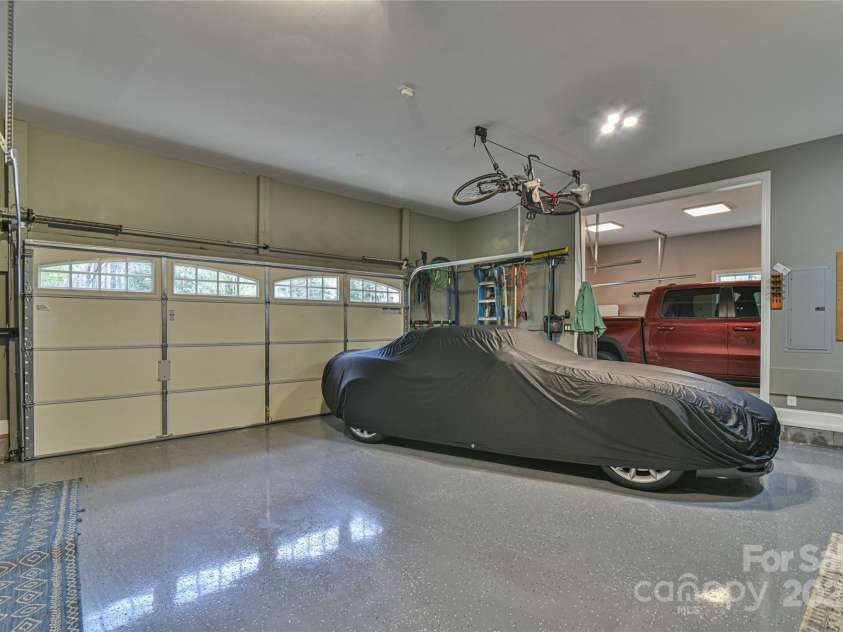 79 Pattys Chapel Road, Fletcher, NC 28732.  MLS# CAR4239671, YatesRealty ID 5295. Three-car garage