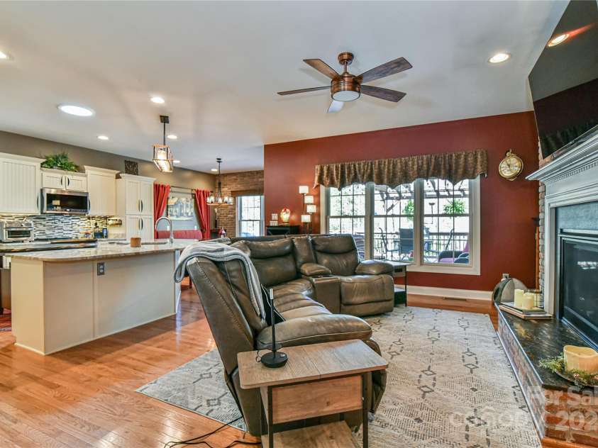 79 Pattys Chapel Road, Fletcher, NC 28732.  MLS# CAR4239671, YatesRealty ID 5295. View into the family room and kitchen
