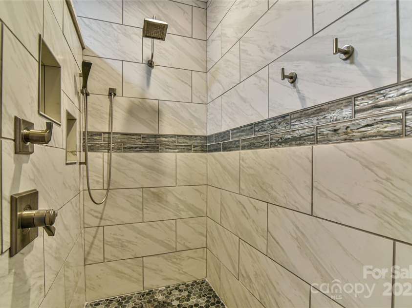 79 Pattys Chapel Road, Fletcher, NC 28732.  MLS# CAR4239671, YatesRealty ID 5295. Walk-in shower detail