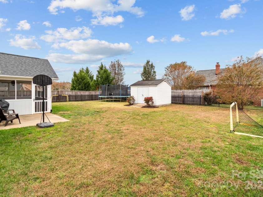 3419 Brickyard Lane, Midland, NC 28107.  MLS# CAR4266112, YatesRealty ID 5296. Large fully fenced backyard