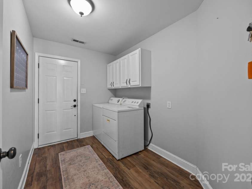 3419 Brickyard Lane, Midland, NC 28107.  MLS# CAR4266112, YatesRealty ID 5296. Large Laundry room with entry to garage