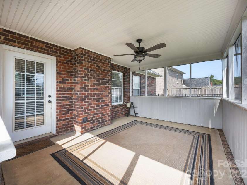 3419 Brickyard Lane, Midland, NC 28107.  MLS# CAR4266112, YatesRealty ID 5296. Screened in sunroom
