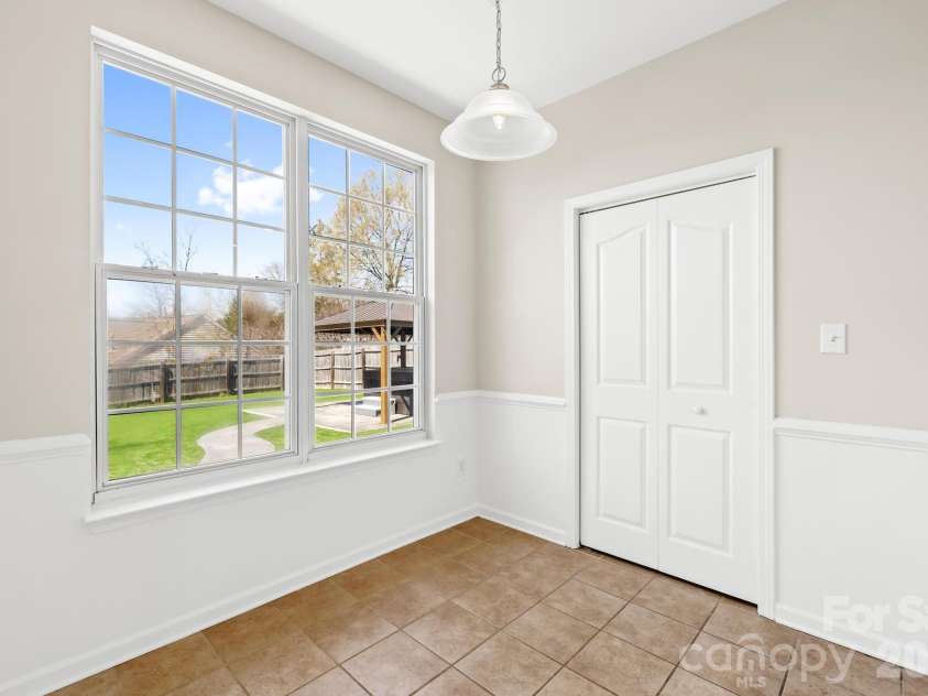 8805 Firestreak Drive, Charlotte, NC 28216.  MLS# CAR4359564, YatesRealty ID 5296. Breakfast Room off Kitchen 
