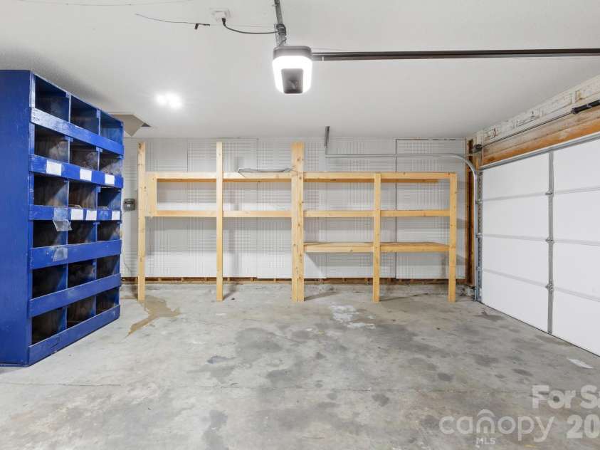 8805 Firestreak Drive, Charlotte, NC 28216.  MLS# CAR4359564, YatesRealty ID 5296. Garage