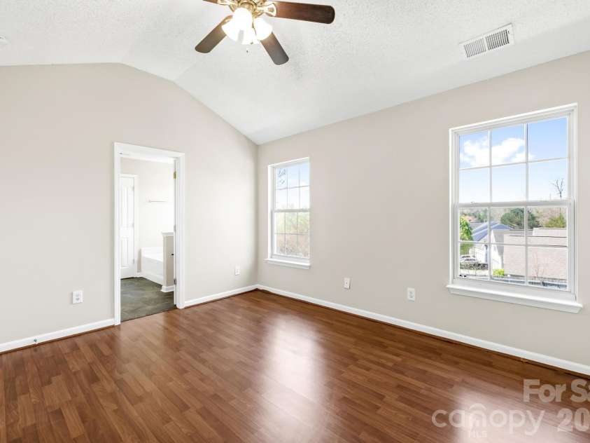 8805 Firestreak Drive, Charlotte, NC 28216.  MLS# CAR4359564, YatesRealty ID 5296. Primary Bedroom with vaulted Ceiling 