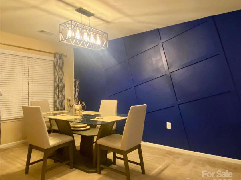 11627 Tribal Drive, Charlotte, NC 28214.  MLS# CAR4214830, YatesRealty ID 5297. Beautiful dining room with accent wall