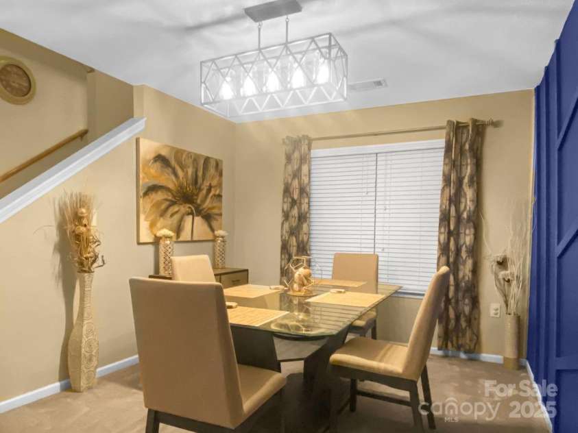 11627 Tribal Drive, Charlotte, NC 28214.  MLS# CAR4214830, YatesRealty ID 5297. Beautiful dining room with accent wall