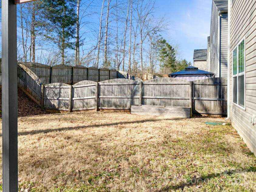 11627 Tribal Drive, Charlotte, NC 28214.  MLS# CAR4214830, YatesRealty ID 5297. Great space with a raised garden bed