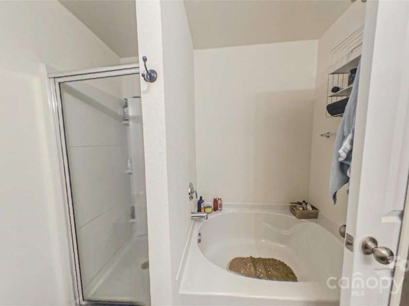 11627 Tribal Drive, Charlotte, NC 28214.  MLS# CAR4214830, YatesRealty ID 5297. Primary Bath has separate shower and garden tub