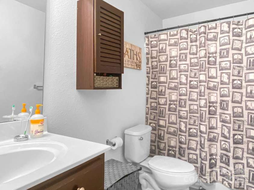 11627 Tribal Drive, Charlotte, NC 28214.  MLS# CAR4214830, YatesRealty ID 5297. Upstairs bath (between bedroom 2 and 3)