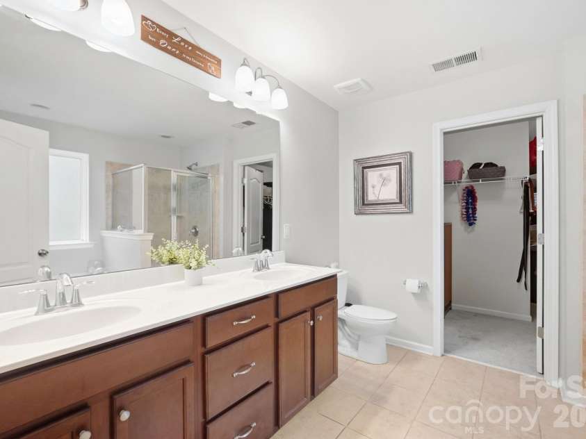 2669 Southern Trace Drive, Waxhaw, NC 28173.  MLS# CAR4426085, YatesRealty ID 52970. Dual Sinks and Ceramic Tile flooring