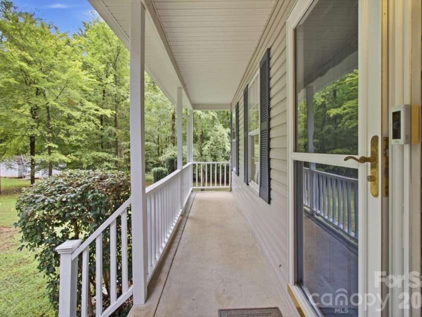 128 Maxamy Lane, Mooresville, NC 28117.  MLS# CAR4425165, YatesRealty ID 52979. Cozy front porch