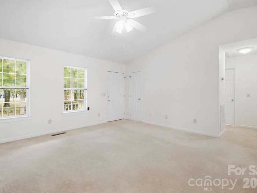 128 Maxamy Lane, Mooresville, NC 28117.  MLS# CAR4425165, YatesRealty ID 52979. Great room with vaulted ceilings