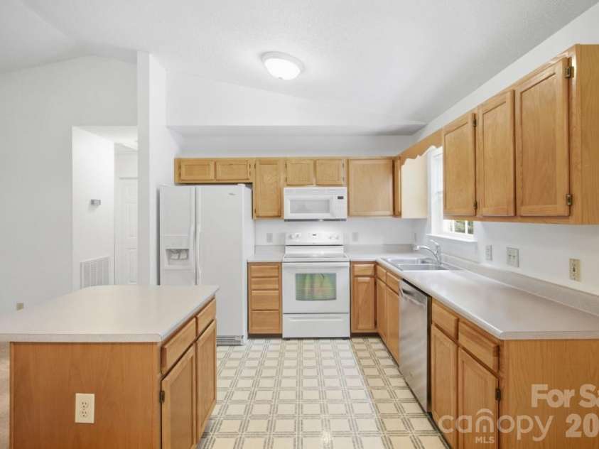 128 Maxamy Lane, Mooresville, NC 28117.  MLS# CAR4425165, YatesRealty ID 52979. Kitchen with island