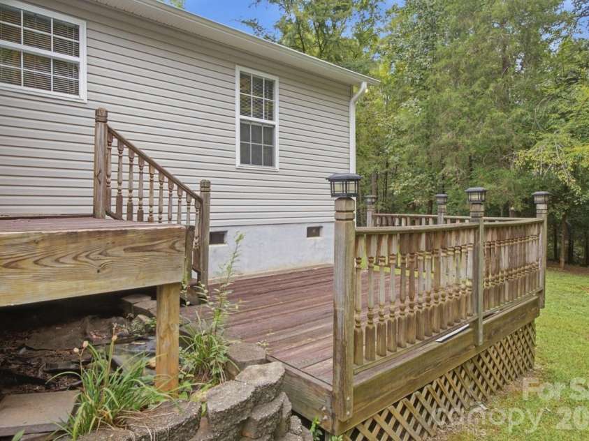 128 Maxamy Lane, Mooresville, NC 28117.  MLS# CAR4425165, YatesRealty ID 52979. Large multi-tiered deck