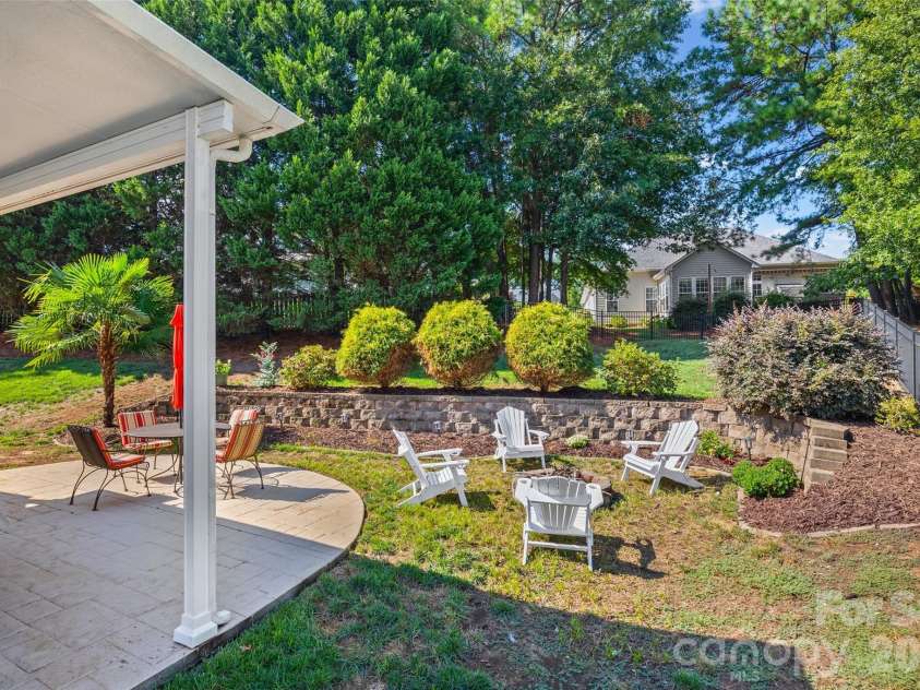 306 Drake Park Avenue, Fort Mill, SC 29708.  MLS# CAR4423650, YatesRealty ID 52985. Patio and fire pit area