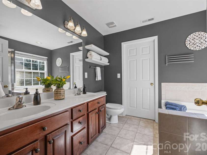 306 Drake Park Avenue, Fort Mill, SC 29708.  MLS# CAR4423650, YatesRealty ID 52985. Primary Bathroom