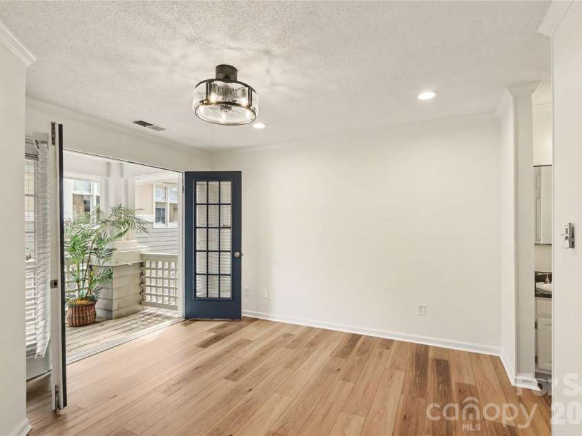 222 Queens Road, Charlotte, NC 28204.  MLS# CAR4422813, YatesRealty ID 52992. Primary suite with balcony