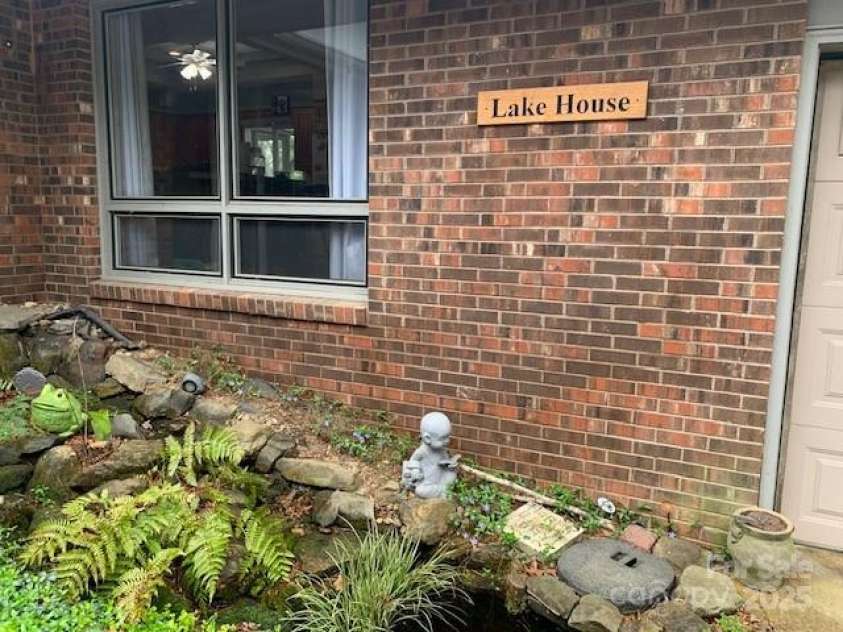 101 LAKEMONT Drive, Flat Rock, NC 28731.  MLS# CAR4246456, YatesRealty ID 53. 