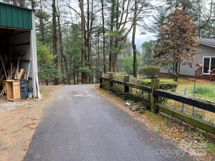 101 LAKEMONT Drive, Flat Rock, NC 28731.  MLS# CAR4246456, YatesRealty ID 53. AWESOME PAVED DRIVE GOING PRIVATELY BELOW