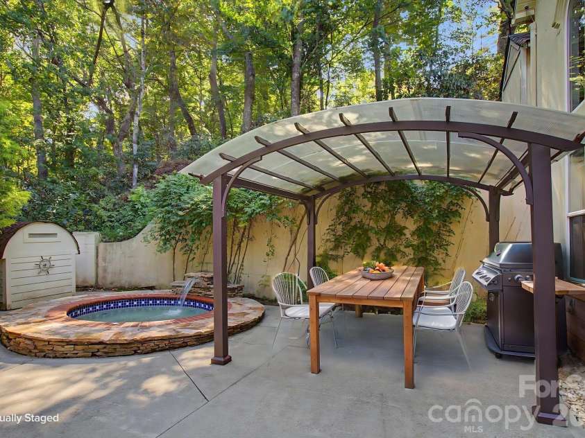 6 Kit Court, Fletcher, NC 28732.  MLS# CAR4421367, YatesRealty ID 53002. Back patio (staged)
