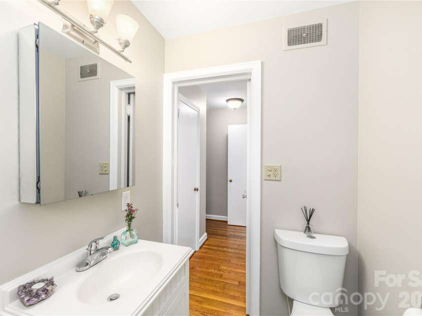 111 Gracelyn Road, Asheville, NC 28804.  MLS# CAR4425992, YatesRealty ID 53011. Bathroom facing into the hallway.