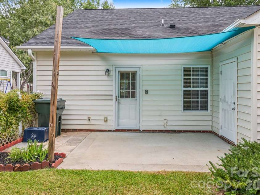 1720 Clemmon Sanders Circle, Rock Hill, SC 29732.  MLS# CAR4424379, YatesRealty ID 53012. Private patio - sun shade installed