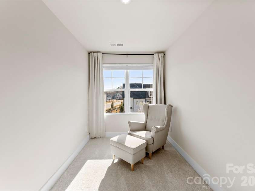9722 Munsing Drive, Charlotte, NC 28269.  MLS# CAR4427726, YatesRealty ID 53017. 3rd Floor Loft/Sitting Area