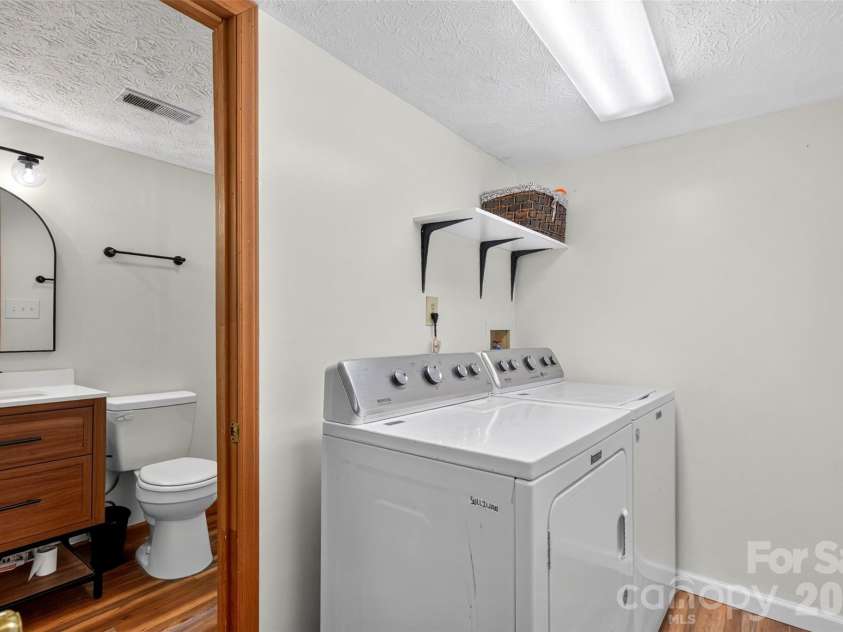 39 Spooks Branch Extension, Asheville, NC 28804.  MLS# CAR4425743, YatesRealty ID 53021. Downstairs laundry room