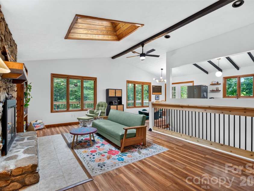 39 Spooks Branch Extension, Asheville, NC 28804.  MLS# CAR4425743, YatesRealty ID 53021. Open-concept tree house feel