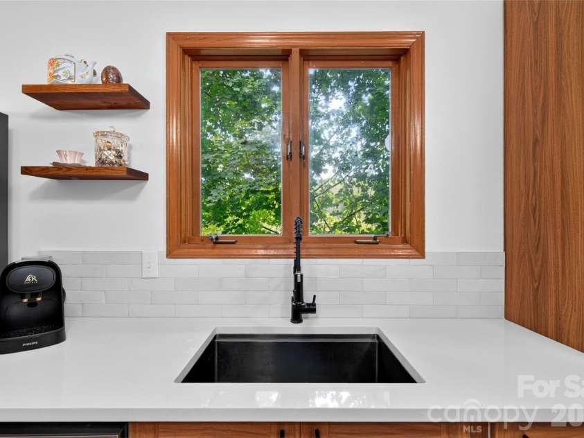 39 Spooks Branch Extension, Asheville, NC 28804.  MLS# CAR4425743, YatesRealty ID 53021. Take in nature from the kitchen window