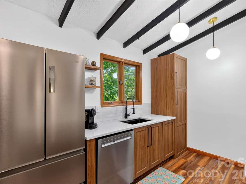 39 Spooks Branch Extension, Asheville, NC 28804.  MLS# CAR4425743, YatesRealty ID 53021. Updated cabinetry with pull-out shelves