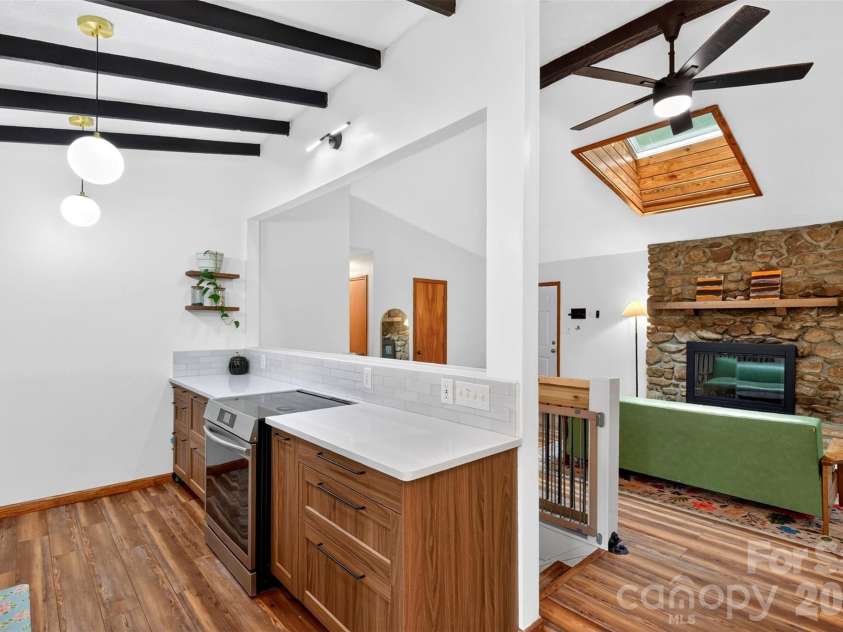 39 Spooks Branch Extension, Asheville, NC 28804.  MLS# CAR4425743, YatesRealty ID 53021. Updated kitchen flows effortlessly