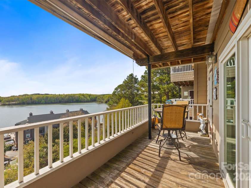 9709 Emerald Point Drive, Charlotte, NC 28278.  MLS# CAR4240090, YatesRealty ID 5304. Large covered balcony