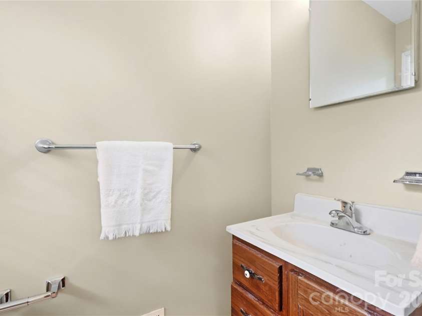1745 Northbrook Drive, Charlotte, NC 28216.  MLS# CAR4428285, YatesRealty ID 53052. Ensuite half bath