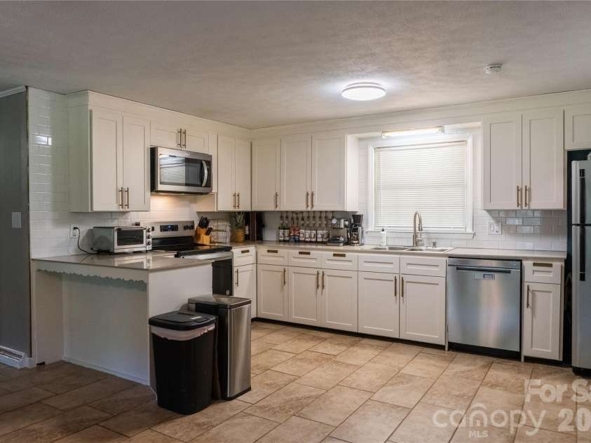 2408 Setzers Creek Road, Lenoir, NC 28645.  MLS# CAR4424956, YatesRealty ID 53057. 