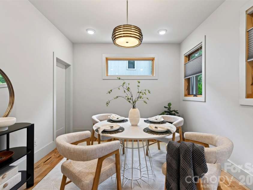 18 Sulphur Springs Road, Asheville, NC 28806.  MLS# CAR4427488, YatesRealty ID 53061. Dining Area gets Great Light